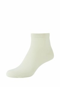 Enkelsok in licht romige kleur met een ribbelboord. Gemaakt van gestructureerde stof, met een naadloze teenontwerp voor comfort.