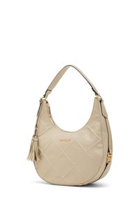 Borsa trapuntata beige con tracolla curva, dettaglio con nappina e logo dorato. Realizzata in materiale liscio e resistente con chiusura a zip.