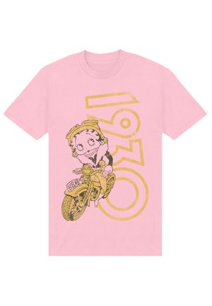 Lyserød t-shirt med en tegneseriefigur på en gul motorcykel, med "1930" printet i fedt guld bagved.