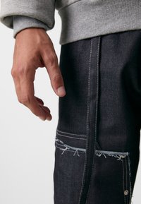 Don't Waste Culture KAJAL UNISEX - Calças de ganga folgadas - raw denim dark blue