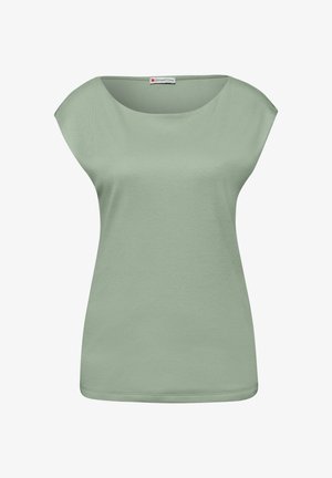 Top senza maniche verde chiaro da donna con spalle larghe e scollo rotondo, tessuto semplice e etichetta Street One all'interno del colletto.