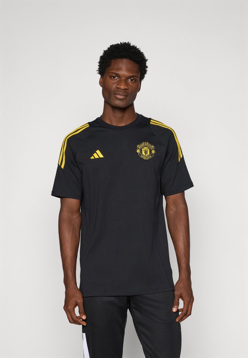 adidas Performance MANCHESTER UNITED 25/26 EUROPEAN COTTON TEE - Article de supporter d'équipe de club - black/tribe yellow