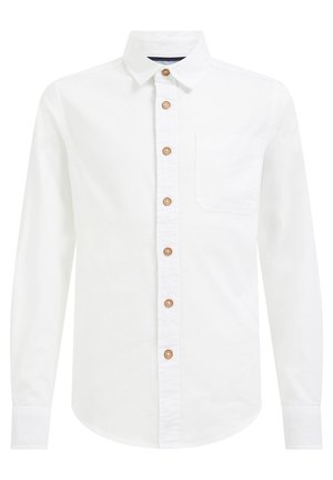 Camisa de algodón blanca de manga larga con cierre de botones en la parte delantera, botones marrones y un bolsillo en el pecho. Diseño de cuello clásico y dobladillo recto.