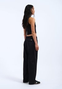 Dr.Denim HILL - Trousers - black