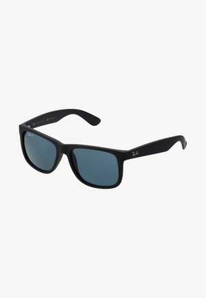 Black plastic sunglasses with blue polarized lenses, rectangular shape, and Ray-Ban logo in white on the temple. Smooth texture throughout.