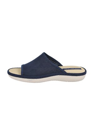 Sandalias deslizantes de color azul marino, fabricadas con material perforado, con una suela gruesa y texturizada en beige claro, punta abierta y detalles de costura.