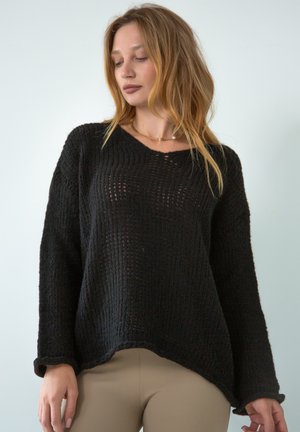 - Sweter