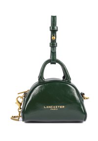Green leather handbag with a rounded shape, double top handles, a removable strap, gold-tone hardware, and embossed logo on the front.