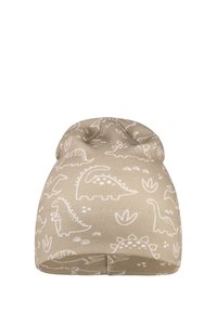 Beige hat with white dinosaur patterns and plant motifs, made from soft fabric. Features a rounded top and a seamless design.