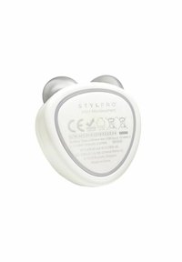 White, heart-shaped mini microcurrent device with silver accents, featuring a smooth surface and informational label on the back.