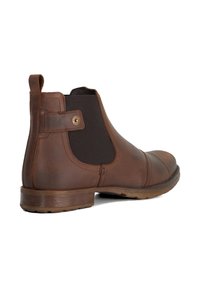 Brown leather chelsea boot with elastic side panel, round toe, and stitched detailing. Flat rubber sole with a small heel.