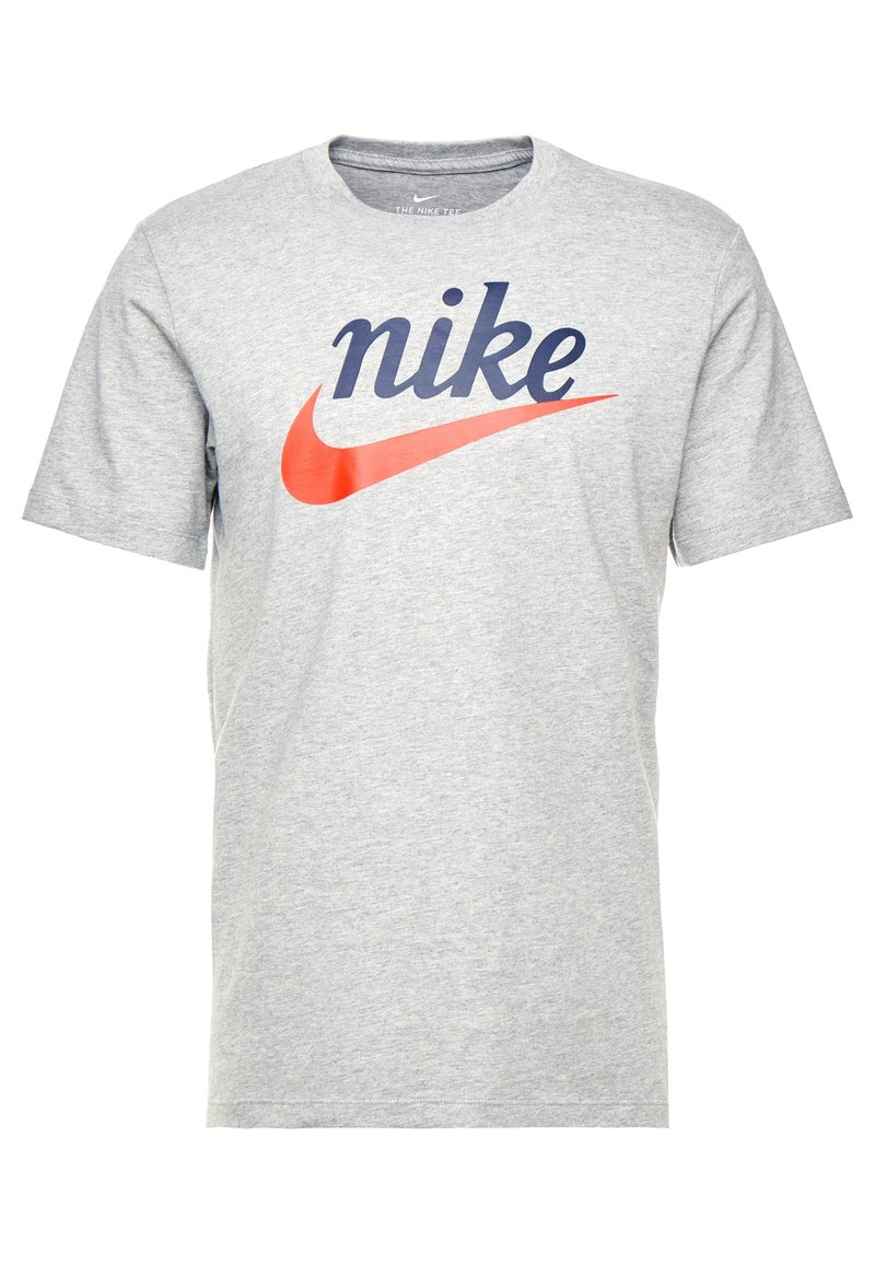 Gray cotton T-shirt featuring a large navy blue "nike" logo and a red Nike swoosh graphic. Short sleeves, crew neck design.