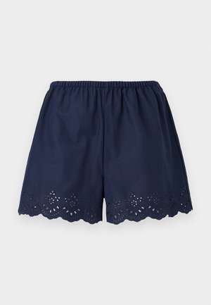 Shorts en coton bleu marine avec taille élastique et ourlet festonné ornés de broderies florales ajourées.