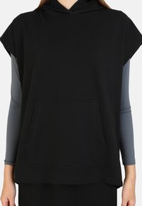 Modanisa BENIN SET - Maxi sukně - black