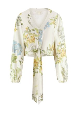 Blouse longue à manches longues couleur crème, col en V, boutonnée sur le devant, imprimé floral en bleu, jaune et vert, avec un nœud sur le devant à la taille.