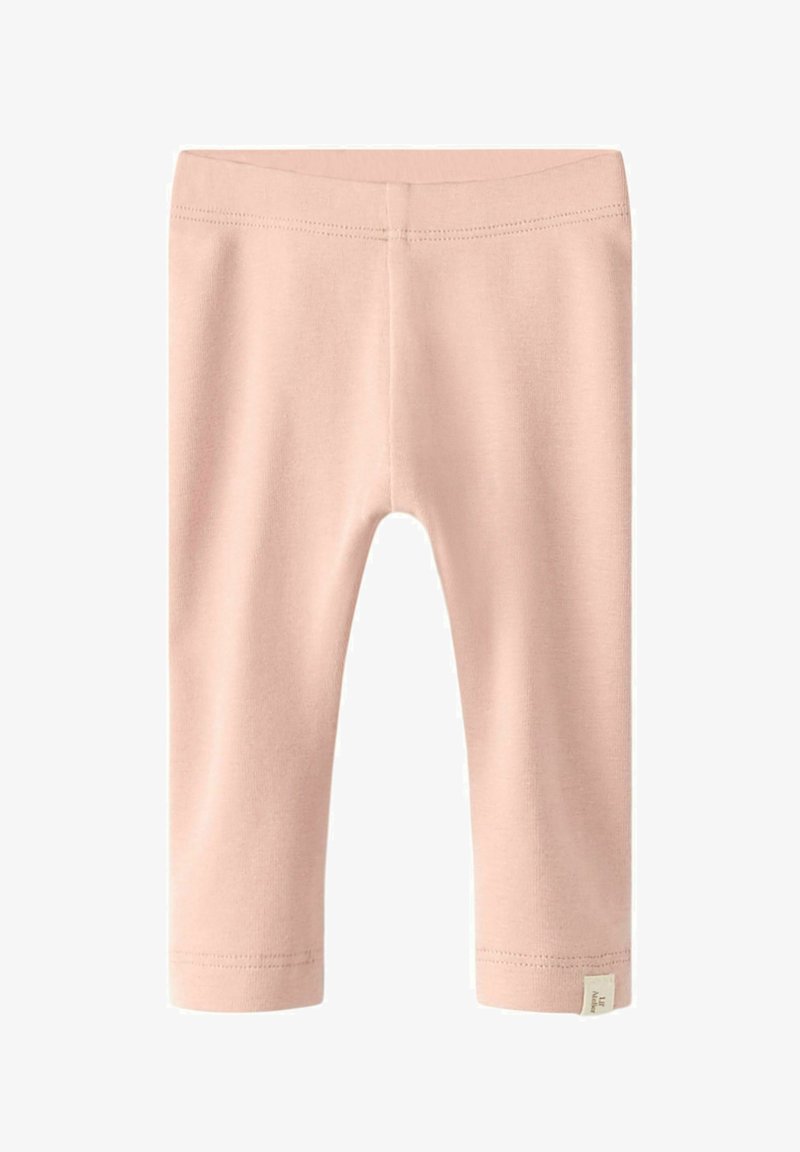 Bladoróżowe legginsy o gładkiej fakturze, długości do kostek, z przeszytym paskiem w talii. Zawierają małą metkę po boku.