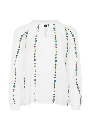 Witte blouse met lange mouwen en verticale borduursels van groene stengels en blauwgele bloemen, voorzien van een keyhole-halslijn met striksluiting.