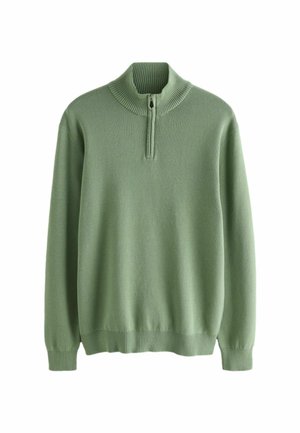 Maglione a collo alto verde chiaro con costine e mezza cerniera. Tessuto morbido e polsini aderenti alle maniche e all'orlo.