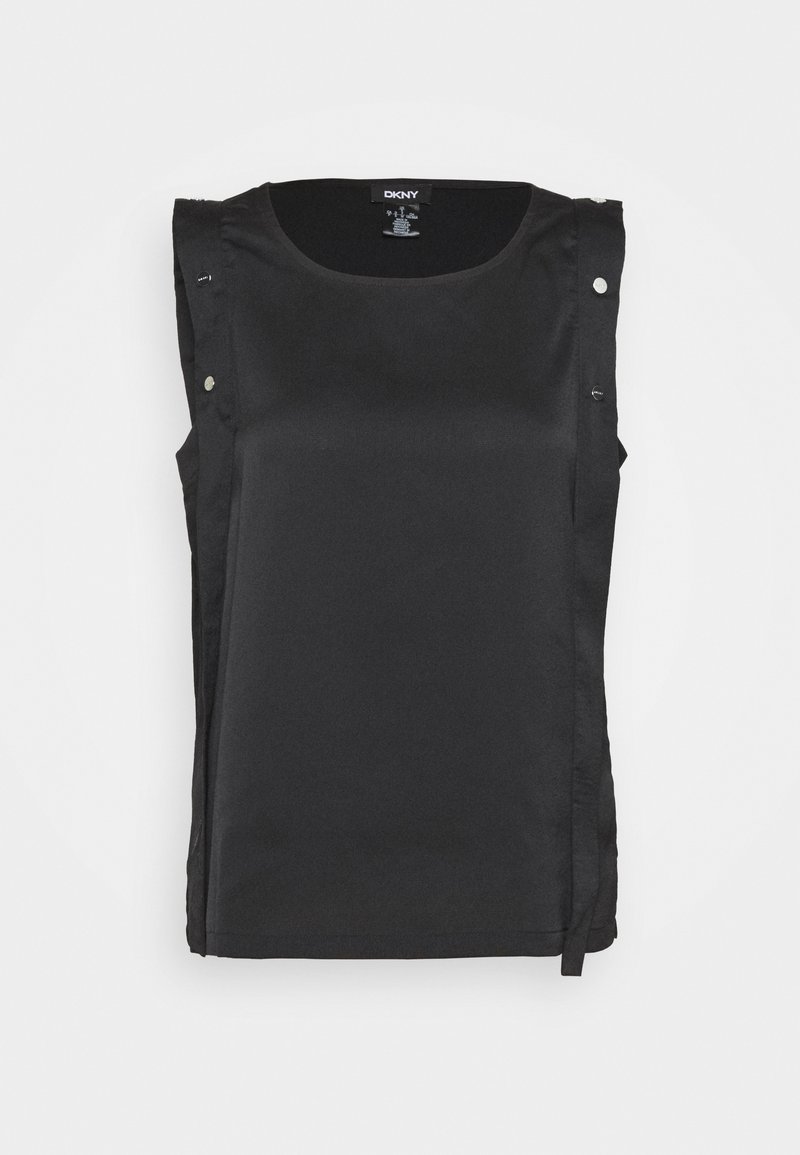 Haut noir sans manches en tissu lisse. Il présente un col rond, des liens sur les côtés et des boutons-pression sur les épaules. Design simple.