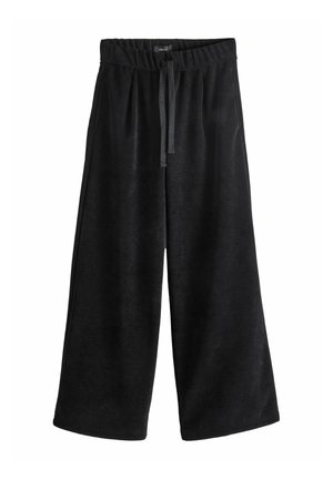 Pantalon large en velours côtelé noir avec taille élastique et cordons à nouer à l'avant, avec poches latérales.