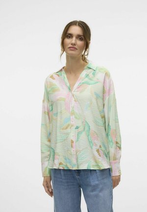 Lightweight, long-sleeve blouse in pastel colors with a leaf pattern, featuring a button-down front and a soft, crinkled texture.