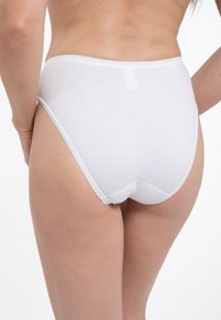 White cotton briefs with a high-waisted design, featuring a smooth texture, elastic waistband, and minimal stitching details.