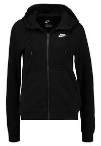 Černá mikina na zip z bavlněné směsi, s kapucí na stažení, předními kapsami, žebrovanými manžetami a bílým logem Nike na hrudi.