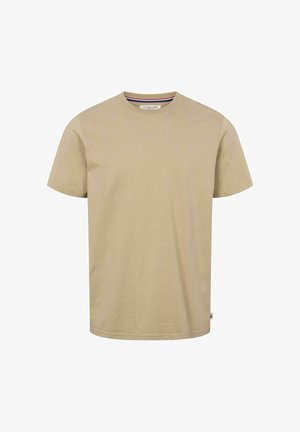Beżowy t-shirt z krótkim rękawem i okrągłym dekoltem z metką U.S. Polo Assn. wewnątrz kołnierza, gładki z przodu oraz małą metką na szwie bocznym.