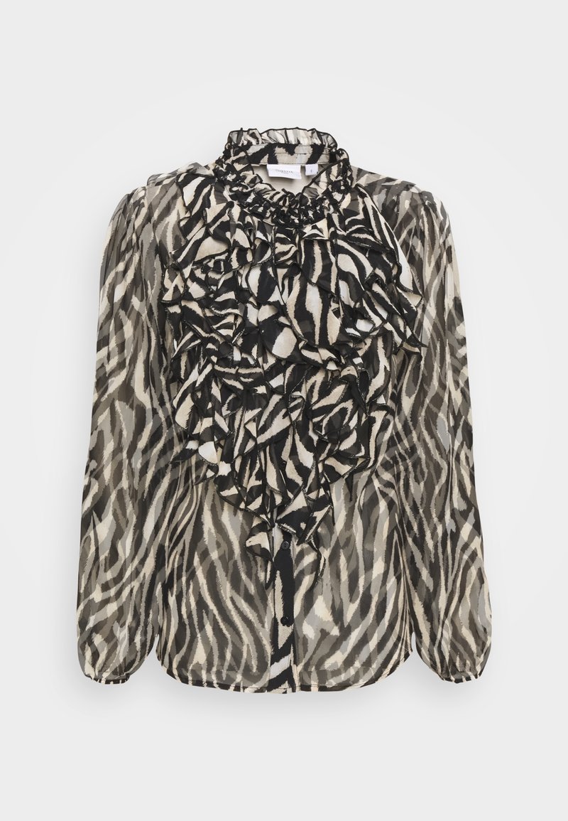 Svart och off-white-mönstrad blus med volang framtill, långa ärmar och hög krage. Tillverkad av genomskinligt, lätt material.