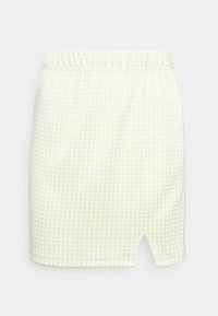 Saia em gingham verde claro com cintura elástica, apresentando uma bainha dividida e uma textura suave. O tecido estampado confere um aspecto xadrez.