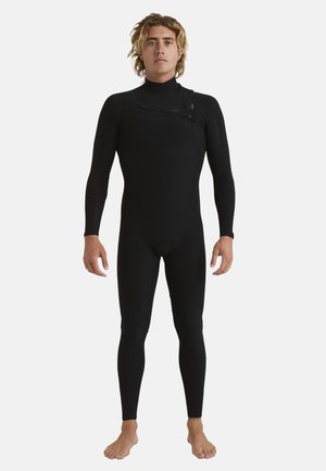 Black wetsuit with long sleeves, featuring shoulder zip, textured knee pads, snug fit, and minimal seams for reduced water entry.