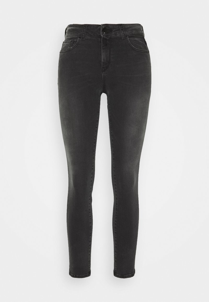 Black skinny jeans with a high waist, made from denim. Features traditional five-pocket design and a smooth, slightly faded texture.