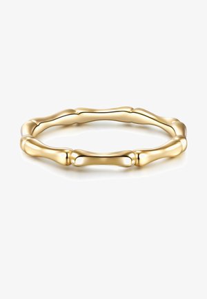 Zlatni prstan s zakrivljenim, neravnim dizajnom koji podsjeća na organske oblike. Glatka završna obrada i sjajna tekstura. Kružni oblik.