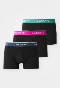 Unselected, noir bleu/vert/rose
