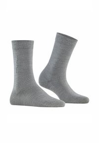 Calze in misto cotone grigio con bordino a coste e una texture liscia, con branding discreto sul lato e punta e tallone rinforzati.