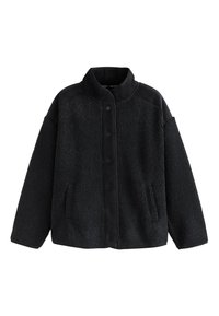 Veste polaire noire avec un col montant, des boutons-pression et des poches latérales. Agrémentée d'un tissu lisse sur les épaules et les poignets. Texture douce.