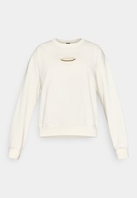 Εκρού φούτερ με στρογγυλή λαιμόκοψη, χαμηλωμένους ώμους και ριμπ μανσέτες. Διαθέτει χρυσή πλακέτα με λογότυπο στο κέντρο. Απαλή υφή υφάσματος.