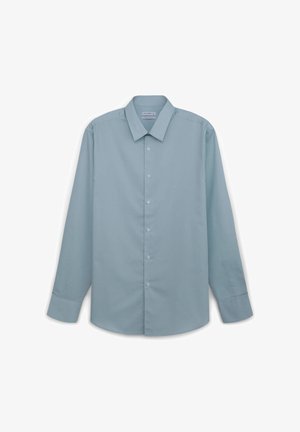 Camicetta azzurra chiara a maniche lunghe con una chiusura a bottoni, colletto a punta e una consistenza liscia. Presenta sei bottoni lungo il centro.