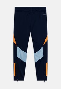 Navy athletic leggings with orange and light blue geometric panels, featuring a mid-rise elastic waistband and zippered ankle openings.