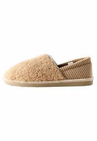 Beige Hausschuhe zum Hineinschlüpfen mit einem flauschigen Äußeren, strukturierten Cord-Seiten und einer Gummisohle. Der Markenname ist dezent auf der Sohle eingraviert.