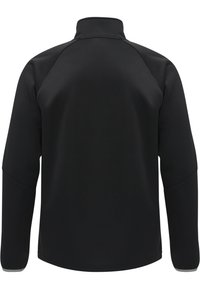 Svart långärmad tröja med hög krage. Tillverkad av mjukt, stretchigt material med raglanärmar och utan synliga knäppningar.