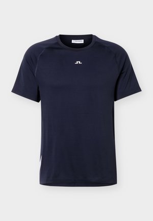 T-shirt bleu marine à manches courtes avec col rond, petit logo blanc centré sur la poitrine et coutures discrètes le long des épaules.