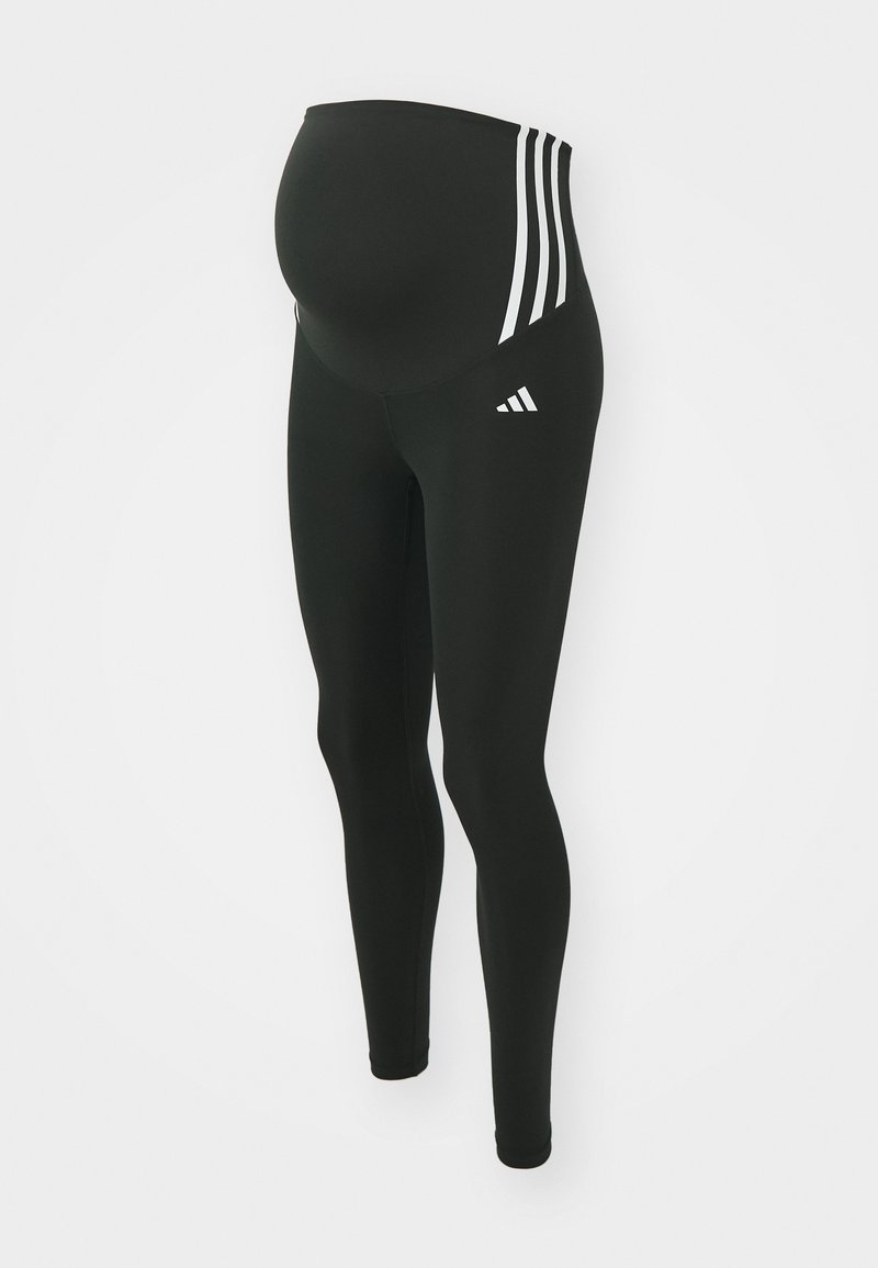 Leggings de maternité noirs en tissu extensible. Dotés d'un design à trois rayures blanches sur la taille et d'un logo près de la cheville.