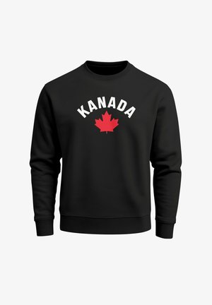 Black sweatshirt with crew neckline, featuring white text "KANADA" above a red maple leaf design on the front. Soft fabric texture.
