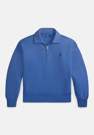 Sudadera de algodón azul con cuello de cremallera parcial, puños y bajo acanalados. Cuenta con un pequeño logo bordado en el pecho izquierdo.