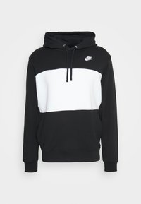 Svartvit huvtröja med framfickor, dragsko på huvan, logotyp på bröstet och ribbade muddar och fåll. Material av bomullsblandning.