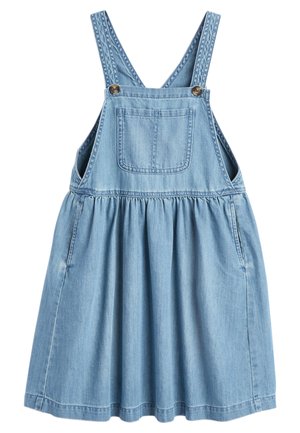 Denim tuinbroekjurk in lichtblauw. Voorzien van verstelbare schouderbanden, een voork pocket, een geplooide rok en een zachte textuur.