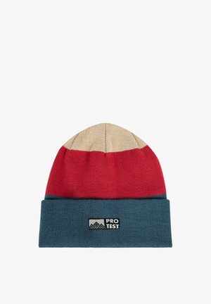 Knitted beanie with beige, red, and blue color blocks, featuring a folded blue brim with a "PROTEST" logo patch.