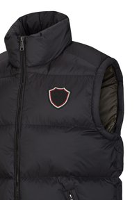 Schwarze Pufferweste mit hohem Kragen, Reißverschluss und Aufnäher mit einem Schilddesign in grün, schwarz und roten Akzenten. Glattes äußeres Material.