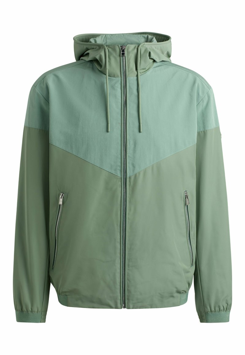 Minzgrüne Jacke mit Kapuze, ausgestattet mit einem Reißverschluss vorne, seitlichen Reißverschlusstaschen und einem Color-Block-Design mit strukturierten Einsätzen. Glattes Material.